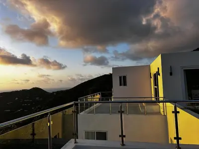 a view of a balcony of a building with a cloudy sky at Zafira Luxe in Leonards