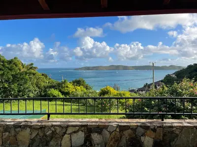 a view of the ocean from a house at Tamarind Villa in Virgin Gorda