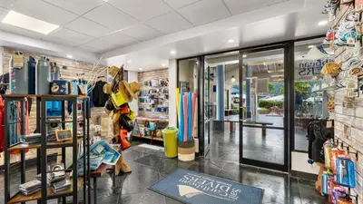 a store with a store front with surfboards at Moorings Yacht Club in Road Town