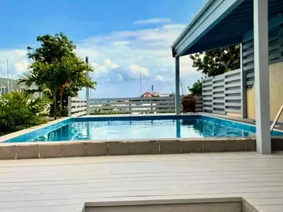 a swimming pool on top of a building at Amazing place on BVI in Road Town