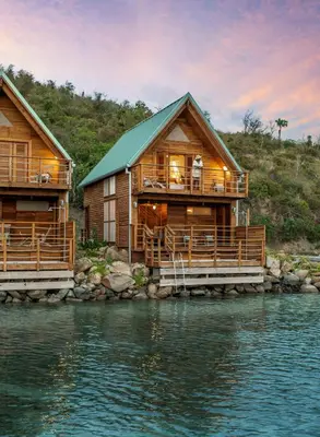 a log cabin on the water with a view at Bitter End Yacht Club in Virgin Gorda